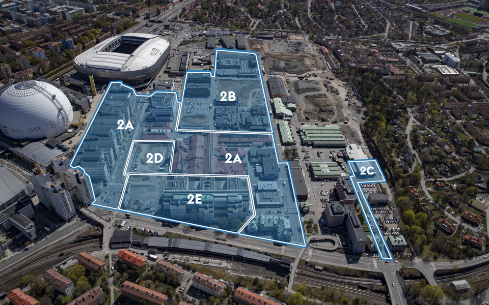 Flygbild över Slakhusområdet med detaljplanerna i etapp 2 markerade med linjer.d med 